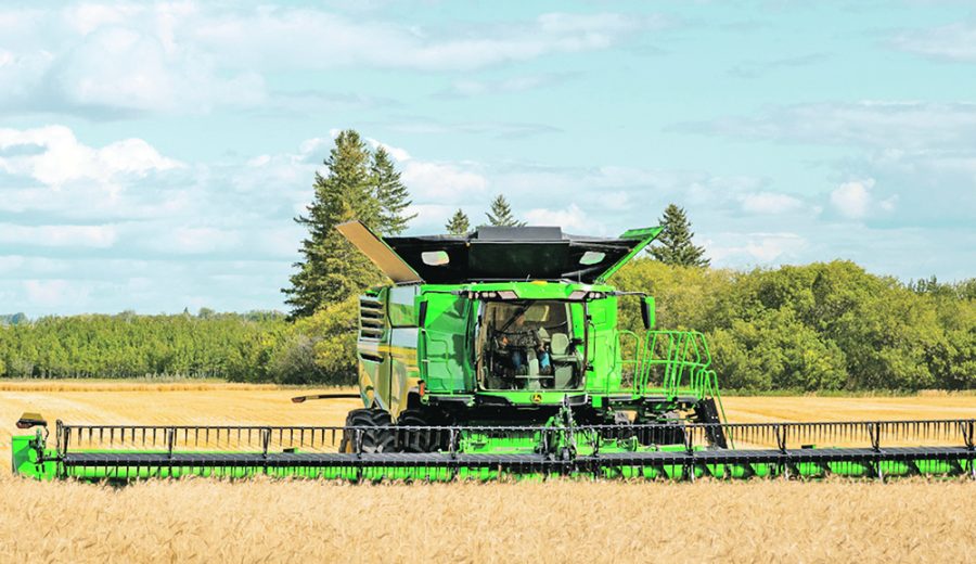 X9 combines have wider feeder-houses, dual separatora, and  over 70 square feet of grain processor. Also for 2021 are new headers including drapers up to 50 feet.  |  John Deere photo